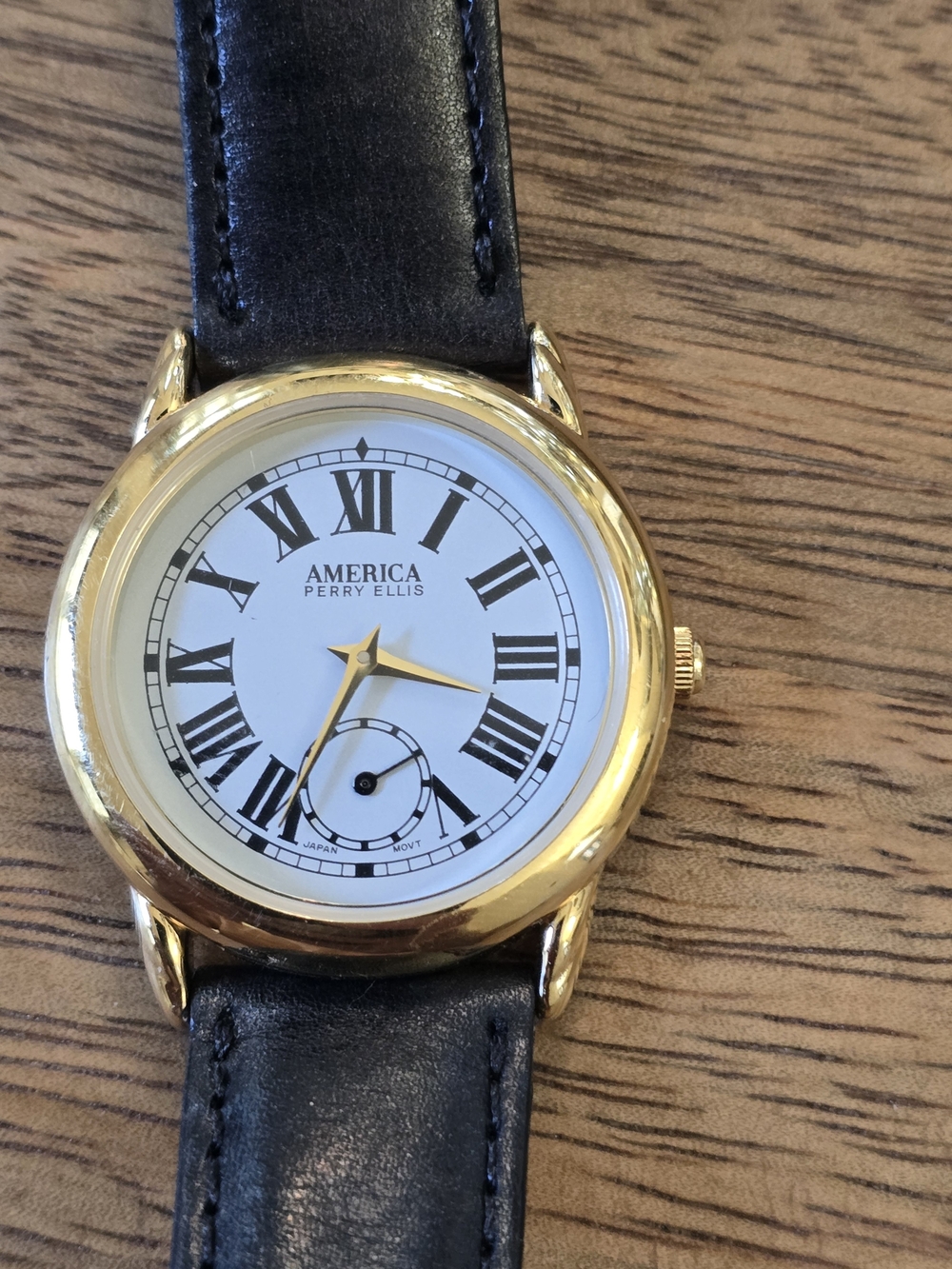 Perry Ellis Men’s Gold Case Black Leather Watch
